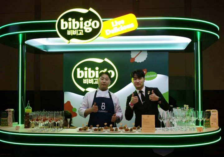 Two young Cuisine K. chefs present a bibigo-based menu. Located at a green booth from “Asia’s 50 Best Restaurants 2024”.