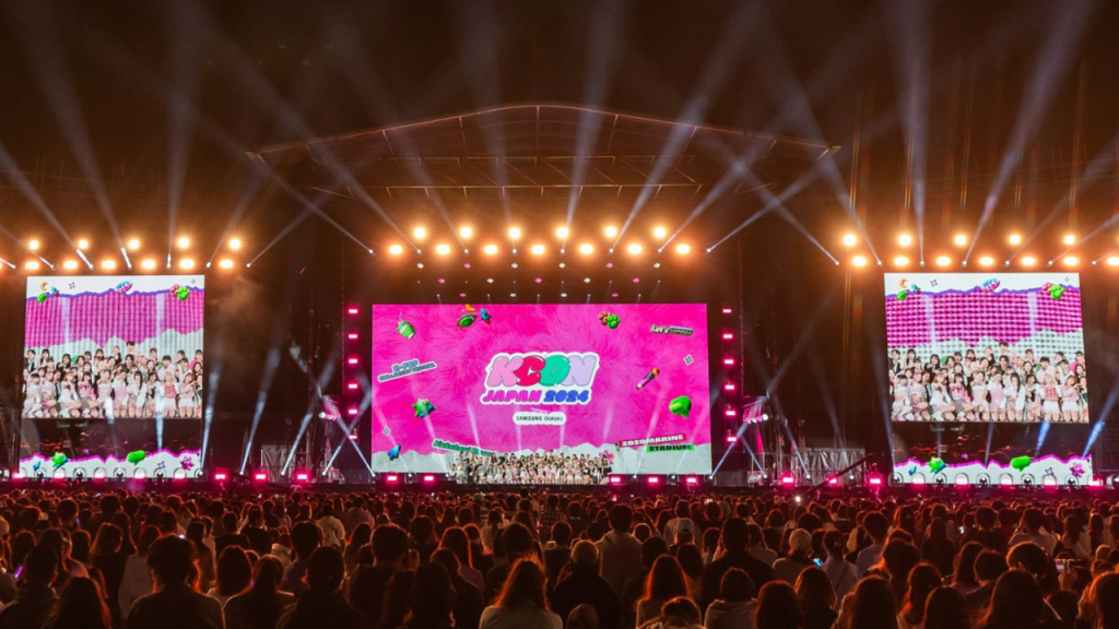 symmetrical image of KCON JAPAN 2024 with a back stage