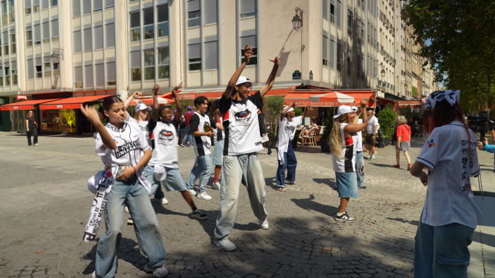 In the streets of Paris, Walking CJ Dance Crew shows off K-pop choreography