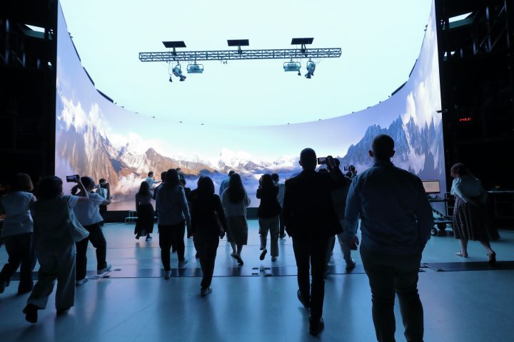 Participants taking photos of CJ's Virtual Production Stage 