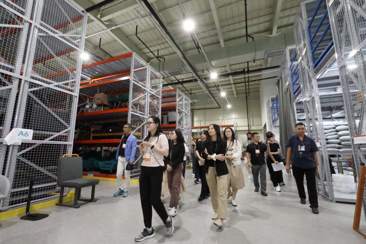 Image of tour participants fascinated School Set at CJ ENM Studio Center,