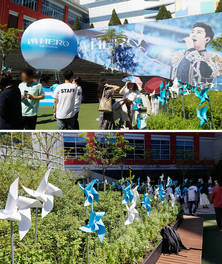 Blue and white banners, balloons, and branded decorations for Lim Young Woong’s “I’m Hero: THE STADIUM” outdoor event.