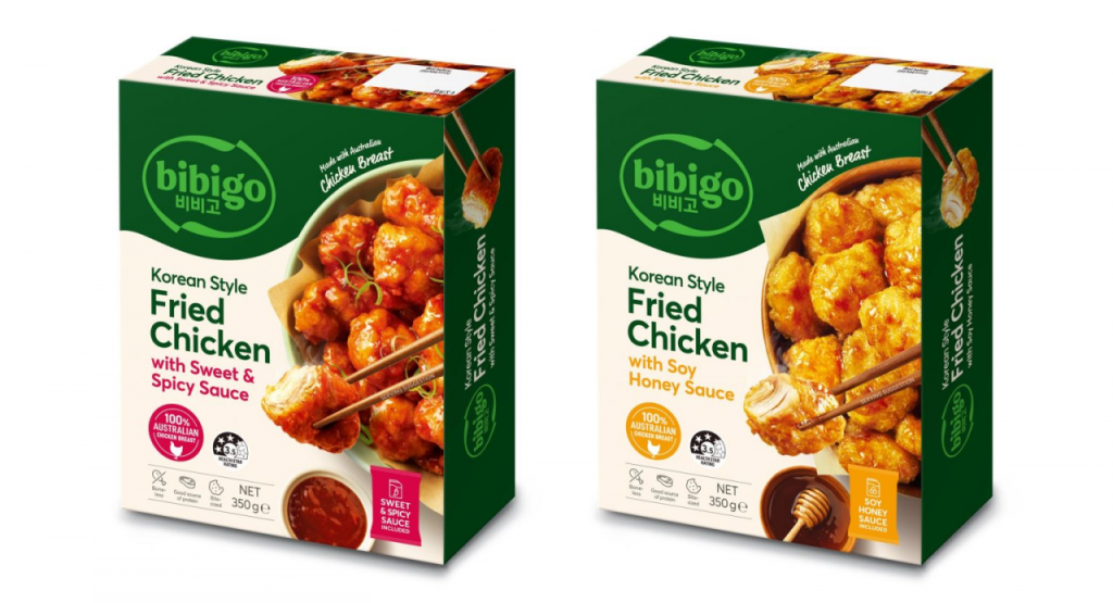 two packages of CJ Foods’ bibigo Korean Style Fried Chicken: Sweet & Spicy Sauce and Soy Honey Sauce
