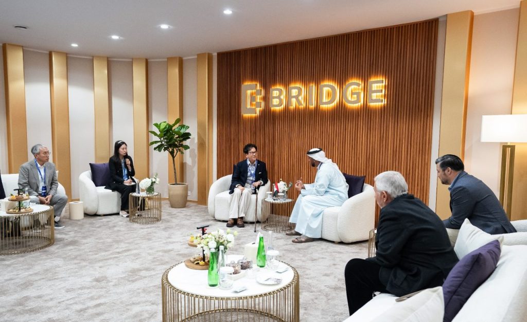 CJ Group Chairman Lee Jay-hyun and key executives next to the Chairman of the UAE National Media Office Abdulla Al Hamed