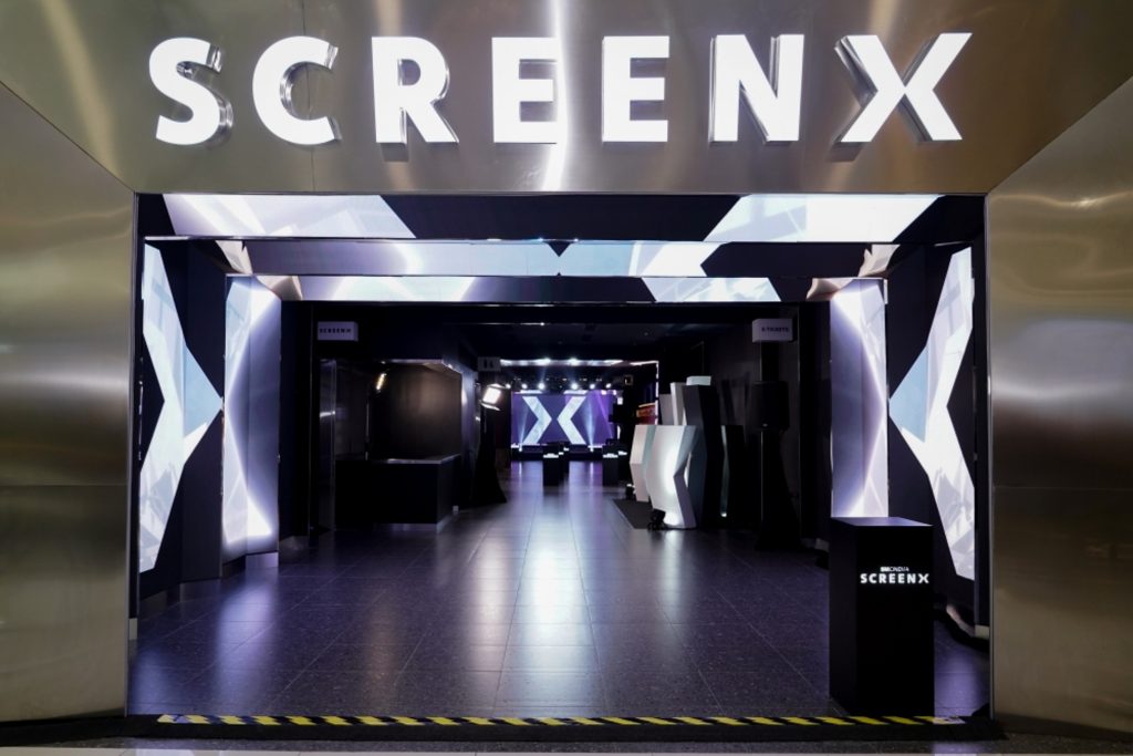 The entrance to the first SCREENX theater in the Philippines, decorated with silver, black and LED lights.