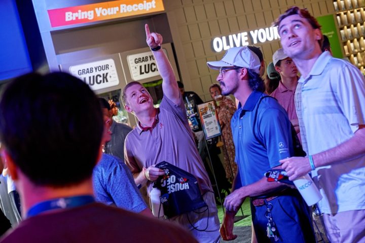 Spectators enjoy the OLIVE YOUNG booth at THE CJ CUP Byron Nelson.