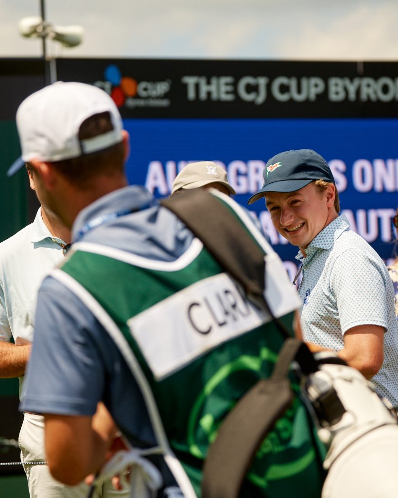 Golfer smiling on the course during THE CJ CUP Byron Nelson in Texas.