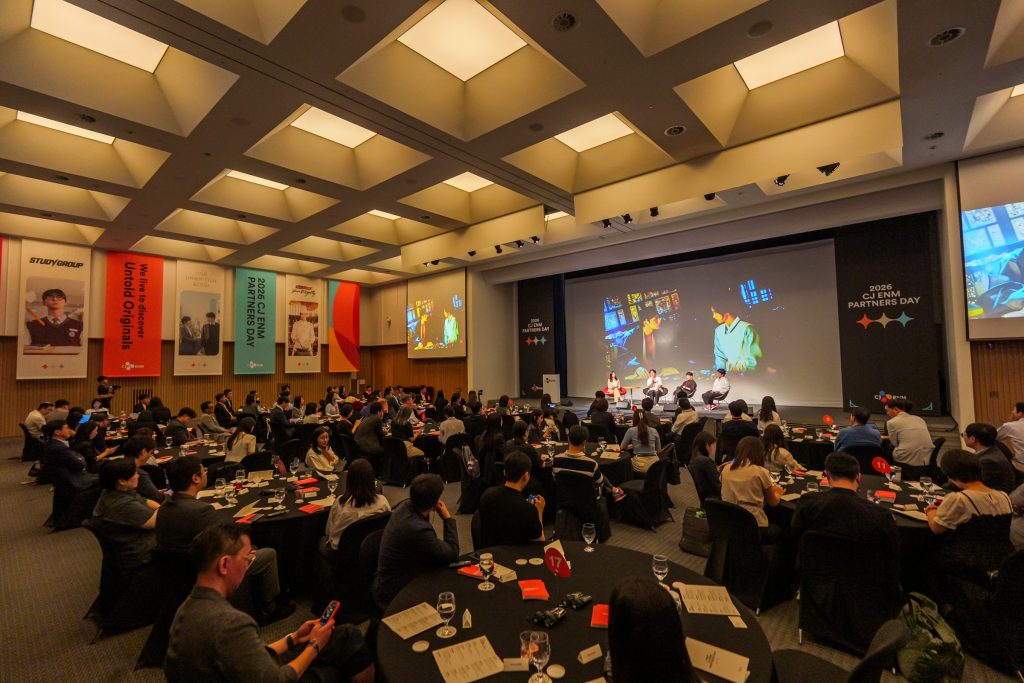 Attendees watch a creator talk session onstage at CJ ENM Partners Day 2026.