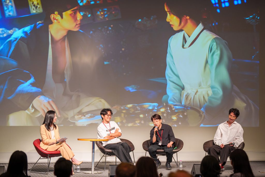 Directors Park Shin-woo, Jang Tae-yoo and Lee Jang-hoon participate in a panel discussion onstage.