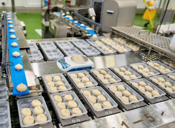 bibigo Mandu moving through a conveyor belt at CJ’s Beaumont plant.