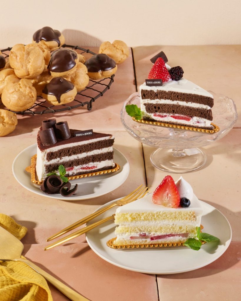 Assorted cakes on display at TOUS les JOURS.