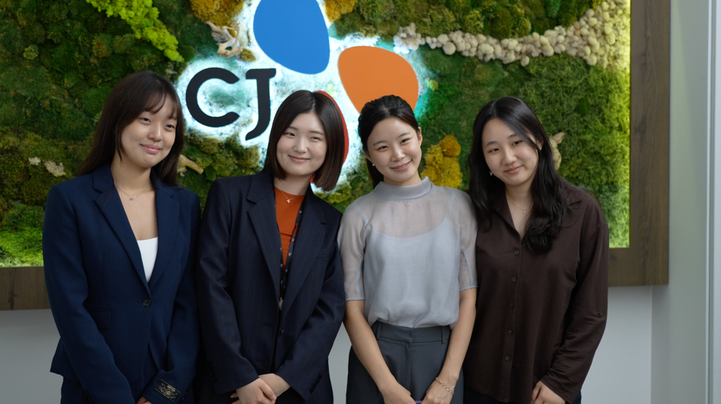 Four CJ America summer interns pose for a group photo at the office.