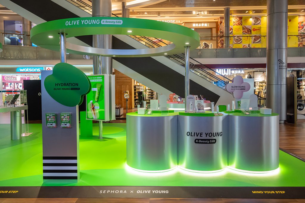 OLIVE YOUNG K-Beauty Edit pop-up in Singapore, showcasing Hydration and Slow Aging skincare zones in partnership with Sephora.